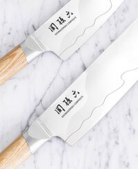 Нож поварской Сантоку KAI Магороку Композит 16,5 см, два сорта стали, ручка светлое дерево - фото 4